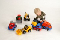 Auto Truxx traktor nakladač s figurkou