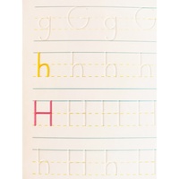 Psaní v drážkách . Učím se psát písmena